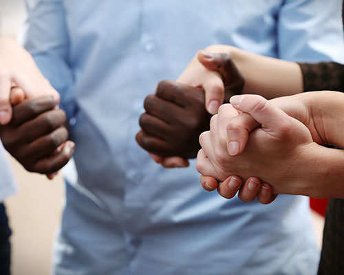 Holding Hands In Prayer